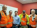 Arizona Governor Doug Ducey (center) meets with the CARC members in the EOC during the Museum Fire